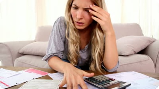Woman-Stressing-Over-Finances.jpg